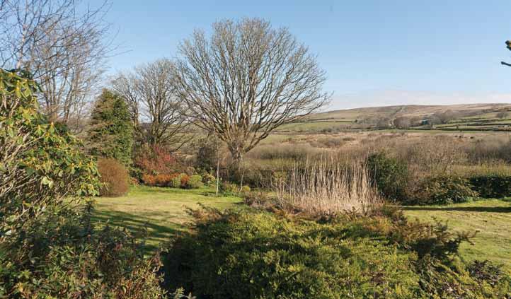 Outside Within the yard there is parking for 5 or more cars and a gate leads past the side of the house to the delightful, large, gently sloping moorland gardens.