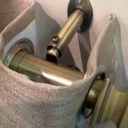 To ensure that the rod does not move when pulling the draperies back and forth across the rod be sure and tighten the