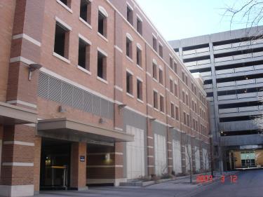 For below grade parking structures, there is no visible evidence of the parking garage other than the parking entrance.