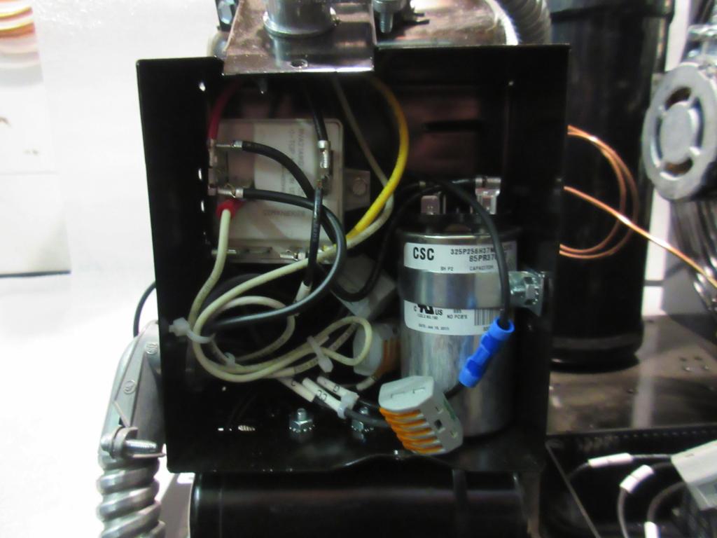 MAGNUM 12000 CONDENSER COMPONENTS COMPRESSOR ELECTRICAL BOX Power from Run Capacitor R Terminal on Compressor (Black Wire Connected to Terminal #2 on the Relay-Potential) (Red Wire Connected to