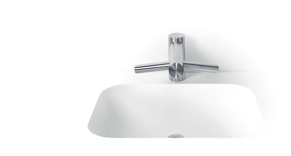 The Bathroom Solution: Background 04/05 Corian basins & washplanes with Dyson Airblade Tap hand dryer, working perfectly together Dyson solve the problems that others seem to ignore James Dyson,