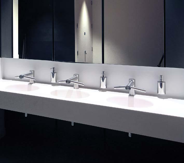 This was achieved with The Bathroom Solution; Corian undermount basins provide the highly durable