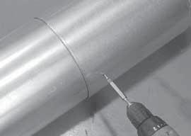 Secure the pipe and slip section with two screws no longer than 1/2 in. (13 mm), using the pilot holes in the slip section. See Figure 7.6. C.