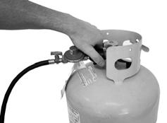 Step 1 Remove plastic cap from top of propane cylinder. Save cap for use in storing.