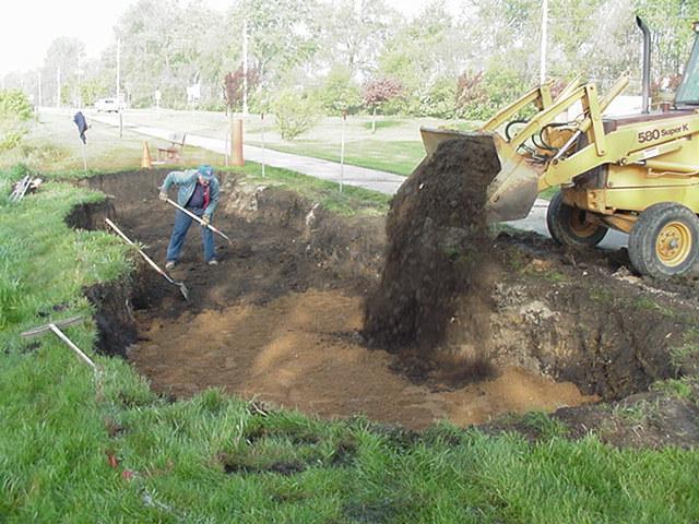 Constructing a Raingarden Excavate the area to approximately 1.5 to 2 feet deep being careful not to compact the native underlying soils.