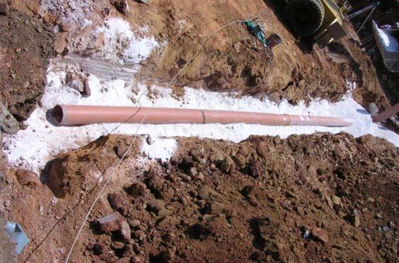 Given the very high thermal inertia of the ground, the conductivity of the pipe is of minor importance.