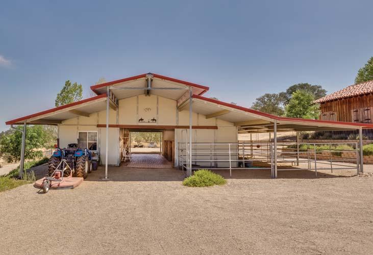 With many options for the equestrian to enjoy, this property also includes 2 barns, stalls,