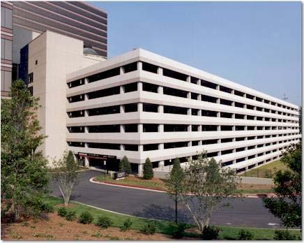 Structured parking decks are one method to significantly reduce the overall parking footprint by minimizing surface parking. Figure 5-19 shows a parking deck used for a commercial development.