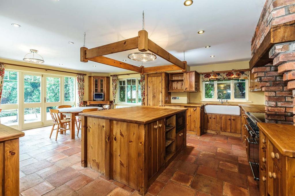 Kingsgate Waste Lane, Kelsall, CW6 0PE A delightful bespoke and Architect designed five bedroomed detached house set in its own grounds with stunning views across the Cheshire countryside.