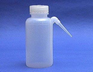 Wash Bottle A wash (or rinse ) bottle has a spout that delivers a wash solution to a