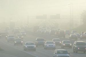 Air pollution from industrial and vehicular emissions.