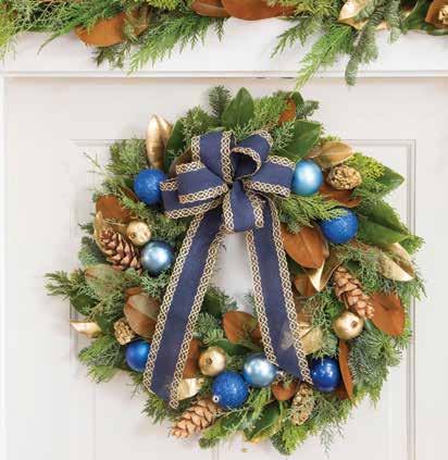 E D F G BLUE HOLIDAY LUXE- New for 2017! Eye-catching magnolia wreath accented with royal and sky blue accents fixed with sugar cones and gold-gilded natural adornments. D. FMW115