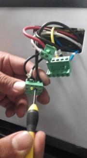 Instructions to replace Ambient Sensor. 1. Remove the front frame of the thermostat using your fingers. 2. Turn 90 both screws to loosen their cams and the front panel will detach.
