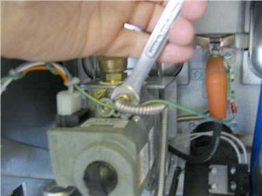 Close Manual Gas Shutoff in Gas Supply Piping by rotating yellow handle until it is perpendicular to gas line. a.