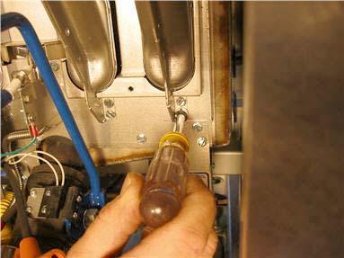 8. Remove gas valve regulator cap screw. 9. Remove regulator adjustment screw. 10. Remove regulator spring. Install new regulator spring. Reinstall regulator adjustment screw 11.