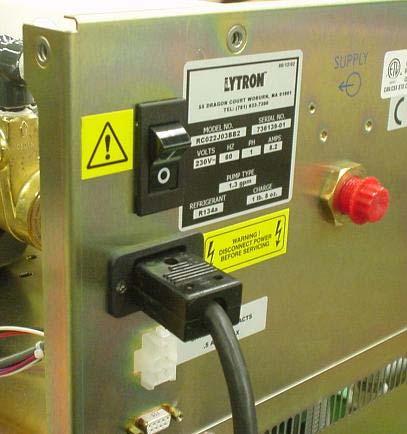 Part VI: Electrical System, Rear Panel Circuit breaker Power entry module Customer contacts (optional) RS232 (optional) On the top rear panel of the chiller you will find a circuit breaker, the