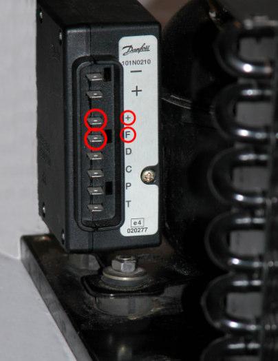 3. Connect the 22-18 gauge insulated female spade electrical terminal (290-0001) attached to the red fan wire to the small + connection on the control module (010-1175).