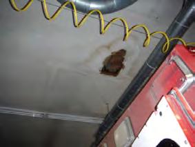 Gaps at the perimeter of service penetrations and framing components as well as holes in the ceiling surface at the Upper-Level Garage Attic ceiling are unwanted pathways for air transfer between the