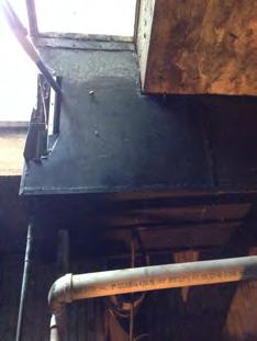 There is an outdoor air combustion air duct that does not have a motorized control damper interlocked with the boiler.