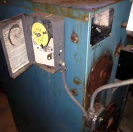 Tankless coil connections Old 3-Way mixing valve Time clock for night setback Recommendations:. Install a new indirect hot water heat exchanger and storage tank for the domestic hot water.