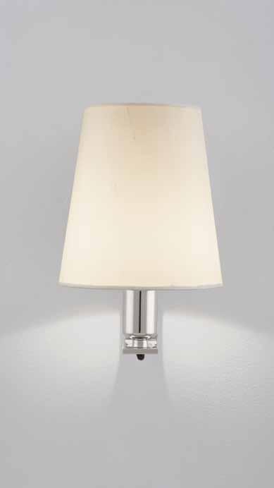 Polished Nickel Silk Krems Wall Lamp Krems polished nickel and polished brass mounting plate reflects soft light cast by a single lamp. Conceived by J.T.