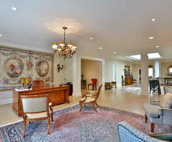 Study/ Media Room The Study/ Media Room features hardwood flooring, French entry doors, opening out to a