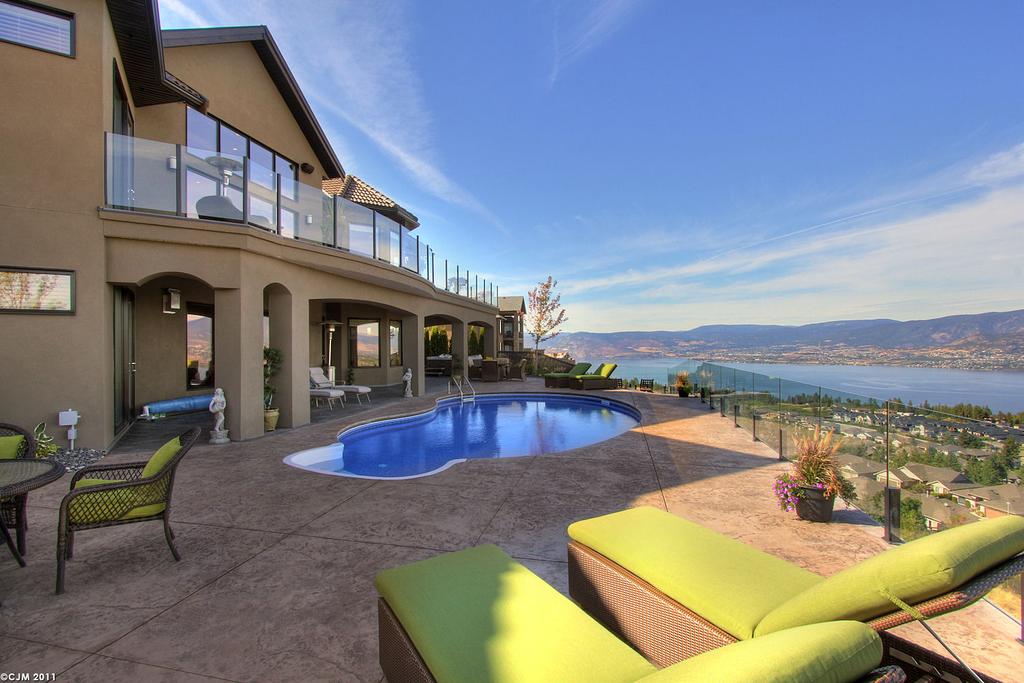 Lake View Home With Pool! Modern design with relaxed, yet formal elegance.