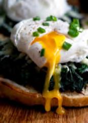 4/5/6 5 Induction A delicately poached egg and sautéed spinach.