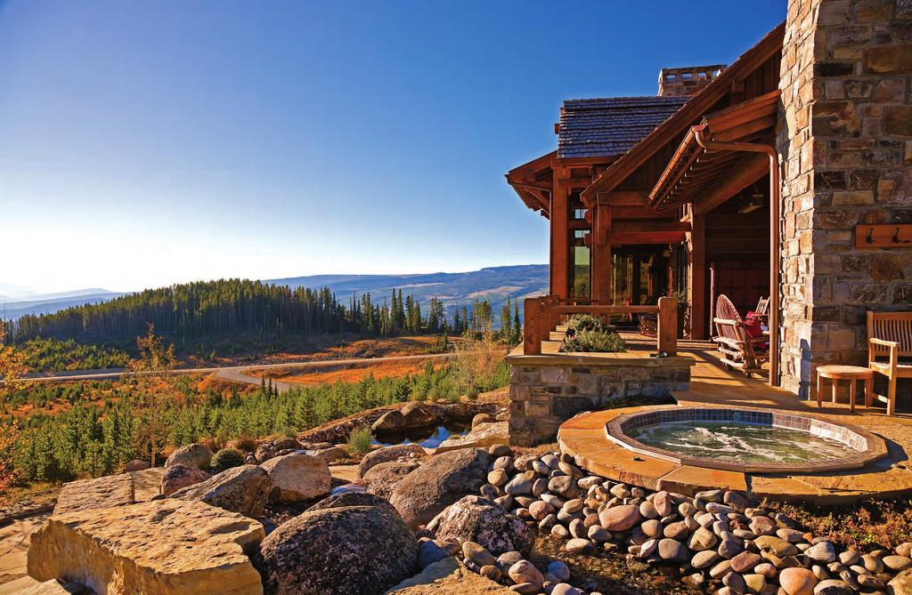December 2014 Mountain Majesty A sprawling lodge near the Rockies showcases reclaimed timbers and jaw-dropping views.