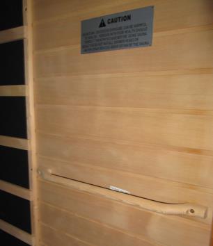 Enter the sauna and remove the protective covering (masking tape) from the TEMPERATURE SENSOR.