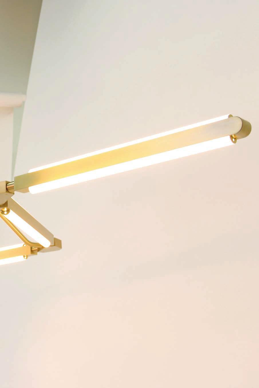 PRIS CROWN, satin brass Each Pris fixture is created with a set of length-adjustable linear arms that attach to jewel-shaped