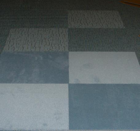 Color change caused by pile or nap distortion known as Traffic Lane Gray or Ugly-Out As carpet is stepped on, the foot twists and turns which can cause fibers to unravel, flair and bloom.