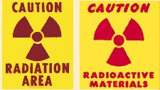 Warning signs indicate the presence of radioactive materials. These signs have a magenta, red or black symbol, called a trefoil, on a yellow background.