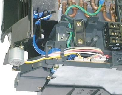 1) Fix the electrical part box by the upper hook of the back body. 2) Tighten 2 screws on the electrical part box.