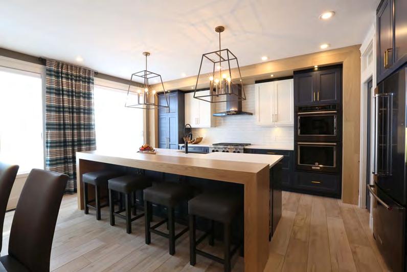 Navy cabinetry is used throughout with