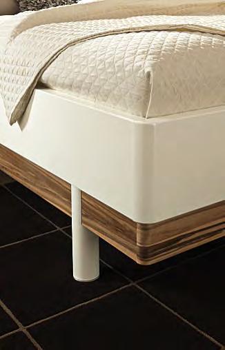White lacquer with elegant amberwood accents gives this classic version a fresh and contemporary touch. High.