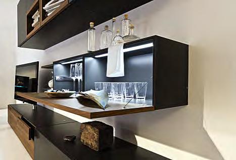 An LED light fillet lights up the front edge of the fitted glass shelf and immerses beautiful objects into a