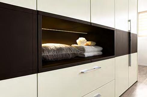 The 95 cm high leather headboard delivers a more subtle room divider solution.