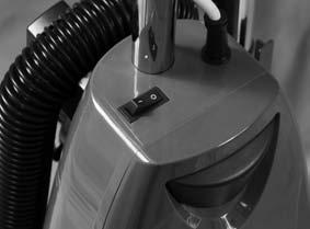 Make sure that the cord hook on the handle is positioned to the back of the vacuum cleaner (Fig. 1). 2.