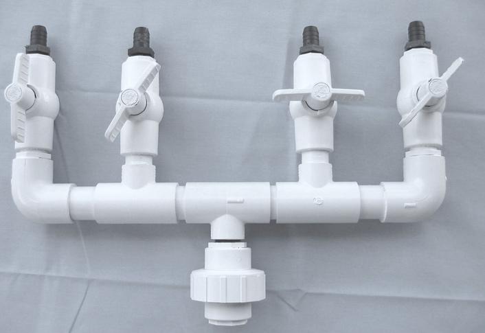 Figure 1. Pipe Manifolds 6. Overboard Discharge. The overboard discharge should be no more than 2 above the water line. This will minimize sound yet allow visual confirmation of water flow.