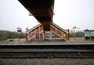 cranked double stair to island platform View of the footbridge from the