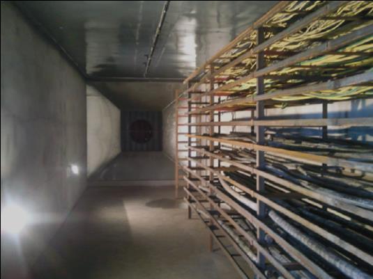 Fire Tests for Cable Tunnels Fire Test Arrangement and Scenarios - Test tunnel of 3 m width and 21 m length with an adjustable ceiling between 3 m and 4 m height - Longitudinal ventilation with 1
