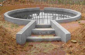 A small thatched hut and fence should be constructed around the tank to reduce the evaporation of water and for the security of children & domestic pets.
