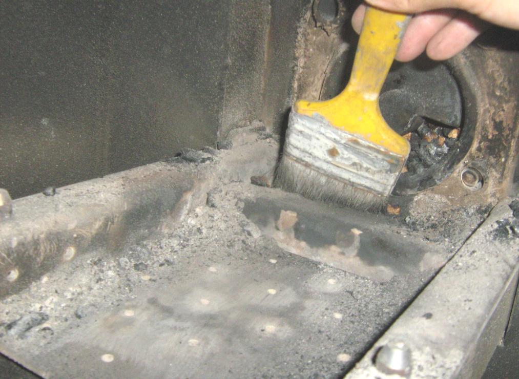 Ash deposited and any heat damage to components may make it difficult to detach the grate.