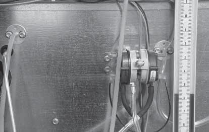 Set the Burner Air Pressure Differential With the fan running and discharging 70 F air, connect a U-Tube manometer to the outer sensing probes (see below) and measure the static pressure across the