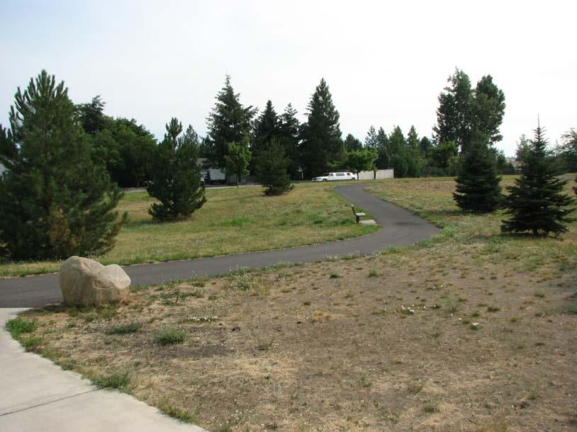 Green Figure 9 - Paved trail with benches