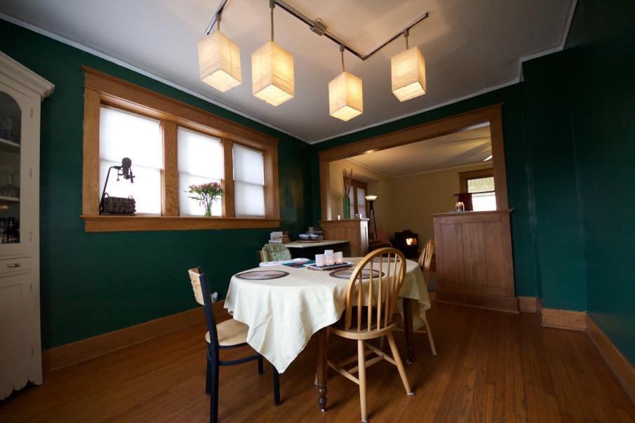 DINING ROOM Leaded Windows Oak Floor Custom Lighting Open Floor