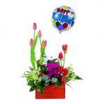 C25.1 Boxed Arrangemnt Arrangement in red box with groups of pink tulips, hot pink gerberas, red roses, cream Singapore