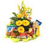 0 Fruit & Flower Basket a combination of fruit and flowers in a rectangular wicker basket.
