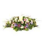 0 Country Basket Arrangement A basket of beautiful cottage like, pastel shades of Lilliums, Carnations, spray Roses, Gerberas, Delphiniums with Camellia